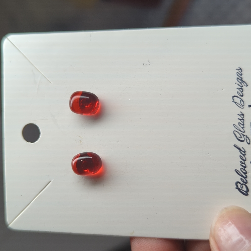 Artisan Handmade red transparent glass gold studs. 3/4cm in size.